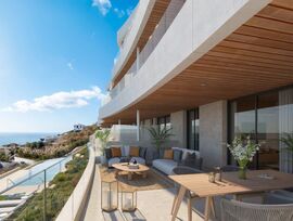 Piso de obra nueva de 3 dormitorios, 2 baños y vistas al mar. Amplia terraza, piscina comunitaria y parking. ¡Tu hogar te espera!